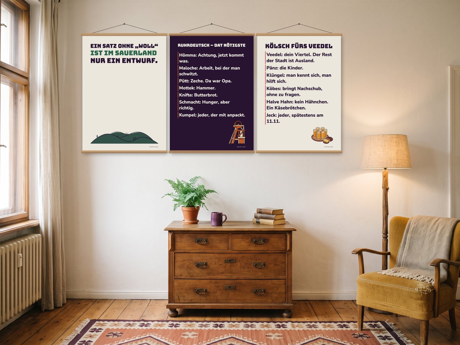 Heimat mit Humor: Poster „Ohne woll nur ein Entwurf“ und „Ruhrdeutsch – dat Nötigste“ und „Kölsch fürs Veedel“ an der Wand