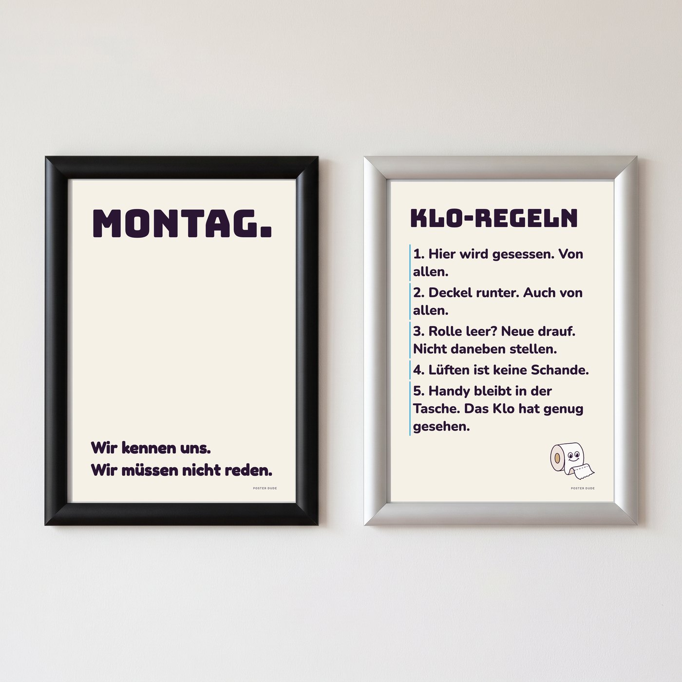 Klapprahmen A4 in Schwarz und Silber mit Postern an der Wand
